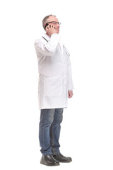 Side view of good looking male doctor using or speaking over or presenting smartphone