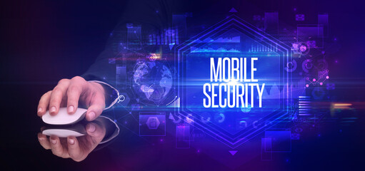 hand holding wireless peripheral, cyber security concept