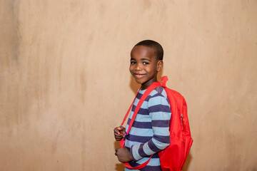 african children with backpack going to school. back to school concept