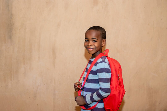 African Children With Backpack Going To School. Back To School Concept