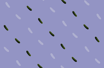 Colorful pattern of fresh cucumbers on purple background. Top view. Flat lay. Pop art design