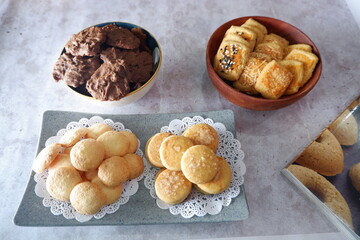 homemade cookies. assorted pastries on a marble table. christmas cookies. Pastries are made of flour, eggs, sugar and cheese. delicious pastries. close up