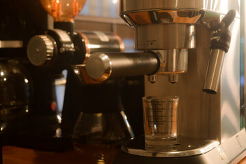 Expresso coffee machine in low light photography concept. suitable for coffee shop photo background