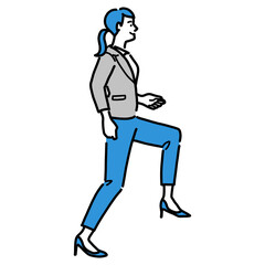 ステップアップしているスーツを着た若い女性
