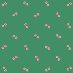 Colorful pattern of pink glazed donuts isolated on green background. Doughnuts. Top view. Flat lay