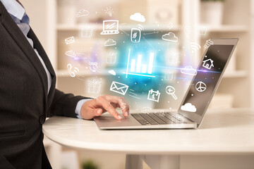 Businessman working on laptop with new business concept