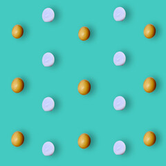 Colorful pattern of chicken eggs on turquoise background. Top view. Flat lay. Pop art design