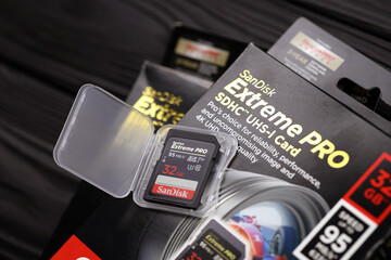 KHARKOV, UKRAINE - JANUARY 12, 2021: SanDisk Extreme pro sdhc 32gb new memory card for photo and video recording devices