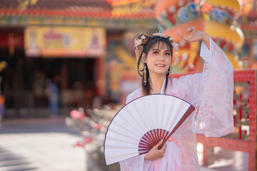 Portrait Beautiful Chinese woman white and pink dress traditional