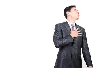 Injured man in elegant suit touching chest