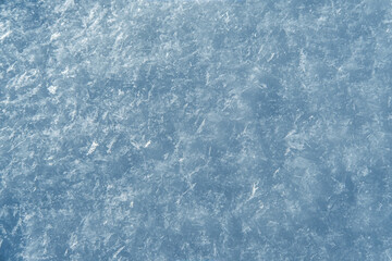 Fresh snow background texture. Winter background with big beautiful snowflakes.