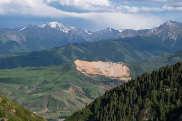 Giant landslide in the mountains near Kolsay lakes and Saty village.