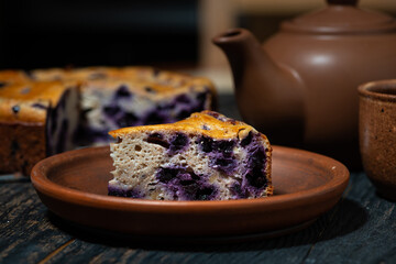 piece of blueberry pie on a plate