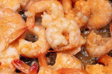 Close-up of boiled shrimp as background.
