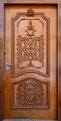 Golden Wood craft Thai classic pattern in door of Thai Temple at Thailand.