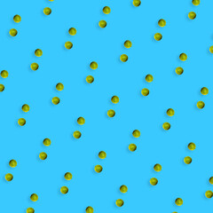 Colorful fruit pattern of fresh limes on blue background. Top view. Flat lay. Pop art design
