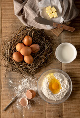 Preparing to Make Bread Using Flour and Eggs
