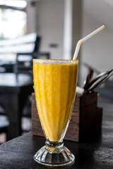 mango shake in long glass