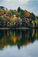 Reflection of colorful leaves on a lake in Waterbury Center State Park, Vermont