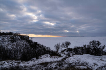 Mount Pivikha and a view of the frozen Dnieper River at sunset