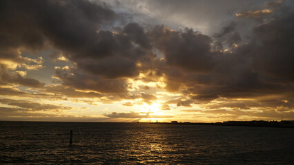 Sunset over the cloudy ocean in Perth, Australia.