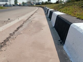 paint job concrete barrier curb and gutter