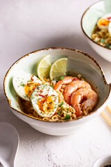 Bowl of ramen soup with shrimps and eggs