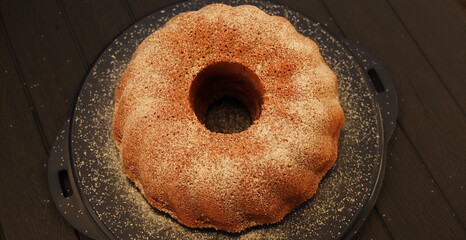 fresh spice cake with powdered sugar