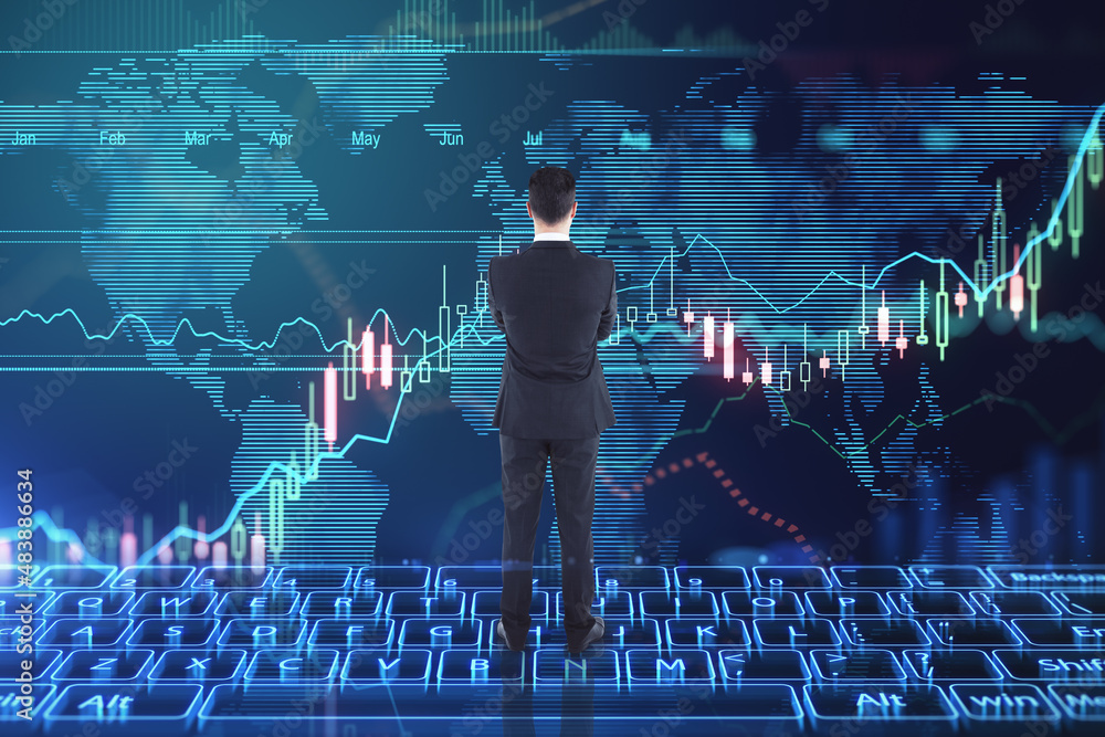 Aufkleber Back view of thoughtful young businessman looking at abstract image of glowing digital keyboard with map and forex chart on dark background. 