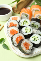 Concept of tasty food with sushi rolls, close up