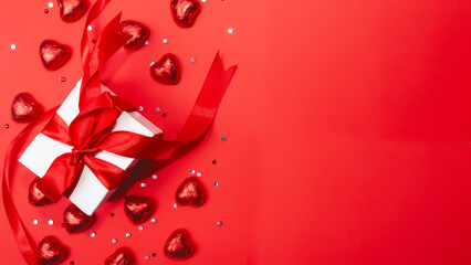 valentines day background. gift box, candy in the form of a red heart. Copy space
