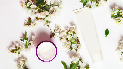 International women's day, Valentine's Day, happy birthday day. Various decorative cosmetics, spring flowers on white background. Flat lay. Copy space. advertising.