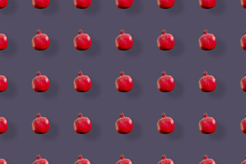 Colorful fruit pattern of fresh pomegranates. Top view. Flat lay. Pop art design