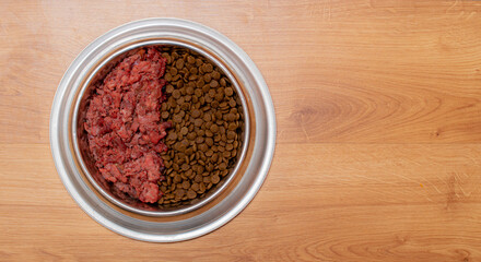 Obraz na płótnie Canvas dog food bowl, meat and dry food