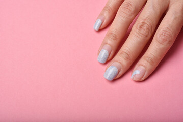 Cracked broken nail, Nail weakness damage from gel polish coating, Fingernail manicure hygiene.