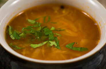 Russian traditional cuisine. A pot of sour cabbage soup.