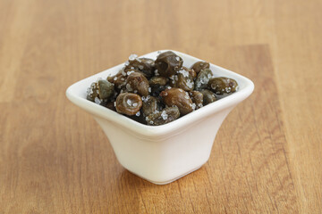 Salted marinated capers snack appetiser