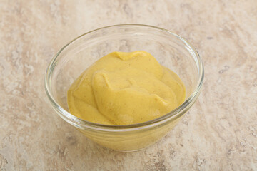 Organic mustard sauce in the bowl