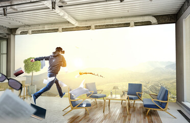 Man wearing virtual reality goggles © Sergey Nivens