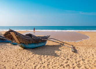 catamaran fishing boat on the sandy beach