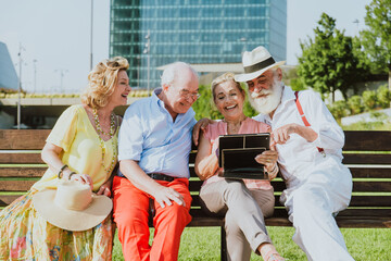 Group of seniors going out at the park and having fun. Concepts about the third age, seniority and...