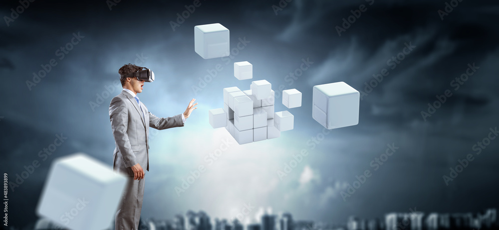 Wall mural Man wearing virtual reality goggles