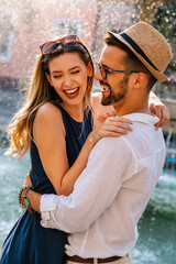 Portrait of happy couple having date and fun on vacation. People travel happiness concept.