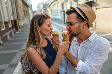Happy tourist couple in love having fun, traveling smiling together on vacation
