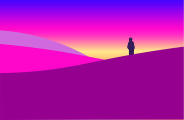 Silhouette of a person standing on hill during sunrise.