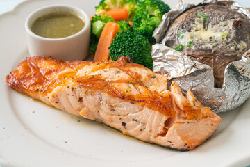 grilled salmon steak with bake potato