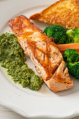 grilled salmon steak with pesto sauce