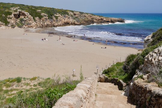 View of Calamosche beach with white sand and turquoise clear water in Riserva Naturale Oasi Faunistica di Vendicari, province Syracuse, Sicily, Italy.