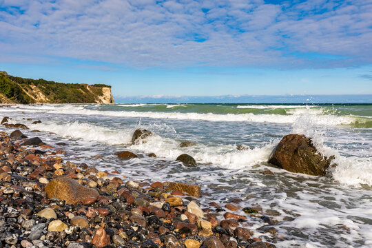 Germany, Mecklenburg-Vorpommern, Rocky beach of Cape Arkona with cliffs in background