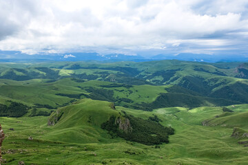 Fototapeta na wymiar View of the mountains and the Bermamyt plateau in the Karachay-Cherkess Republic, Russia.